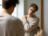 Person Posing In Front of the Mirror