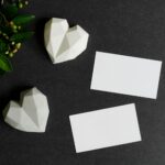 White Papers Besides Heart Shape Paperweight