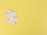 Jigsaw Puzzle on Yellow Background