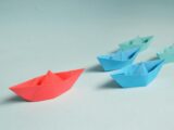 Paper Boats on Solid Surface