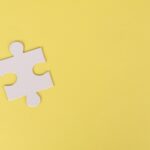 Jigsaw Puzzle on Yellow Background