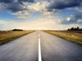 Asphalt Road Under Cloudy Sky