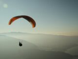 Man Using Parachute