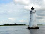 White Light House in the Middle of Sea